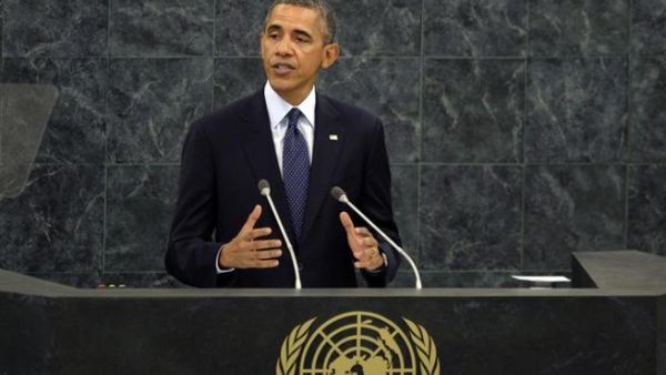 President Obama has said at the UN General Assembly that he is encouraged by Iranian President Rouhani's moderate overtures. (Image credit: AFP)