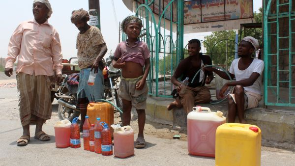 Yemenis sell petrol on the street after Yememi government forces re-entered Zinjibar the capital of the southern Abyan province on August 16, 2016 following an offensive backed by Saudi-led air strikes to recapture the city from Al-Qaeda jihadists. (Photo credit: AFP) Yemenis sell petrol on the street after Yememi government forces re-entered Zinjibar the capital of the southern Abyan province on August 16, 2016 following an offensive backed by Saudi-led air strikes to recapture the city from Al-Qaeda jihadists. (Photo credit: AFP)
