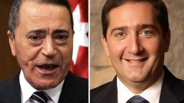 رئيس الوزراء المقال، سمير الرفاعي، ورئيس الوزراء المعين معروف البخيت/أ.ف.ب