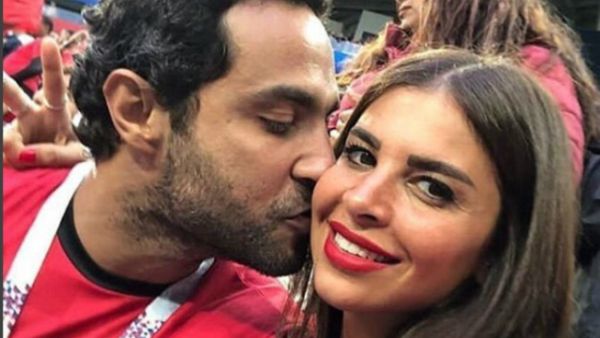 Karim Fahmi expressed his anger on the unjustified attack on him after a picture for him kissing his wife before the match was shared on social media. (Source: karimfahmiofficial - Instagram)
