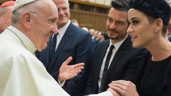 Katy posted an image of the smiling pontiff greeting Perry and her on-off boyfriend, actor Orlando Bloom. (Source: katyperry - Instagram)