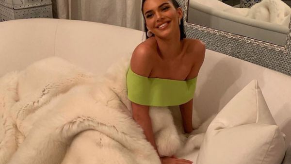 Kendall wore her locks loose with no makeup on during her lounge session (Source: kendalljenner / Instagram) 