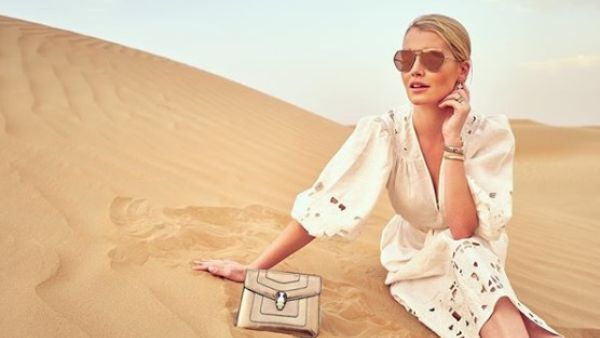 While in Dubai, Lady Kitty Spencer took to the desert where she posed for photos in a cinched-at-the-waist white dress by Australian fashion house Zimmermann. (Source: kitty.spencer - Instagram)
