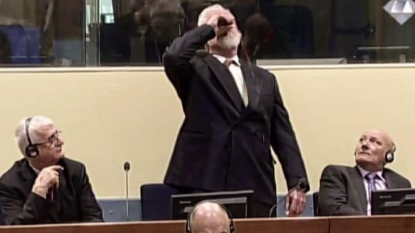 He appeared to drink from a small bottle seconds after losing his appeal (AFP/File)

