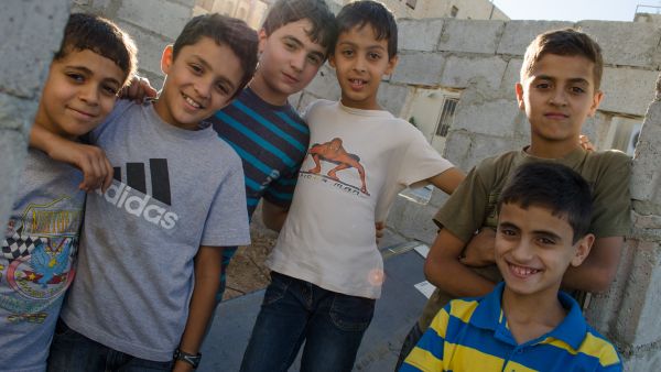 Children in Amman play in the neighborhood bordering the University of Jordan (Albawaba/J. Zach Hollo)