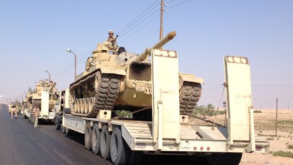 Egyptian military tanks are deployed in the northern Sinai town of Al-Arish (AFP/STR)
