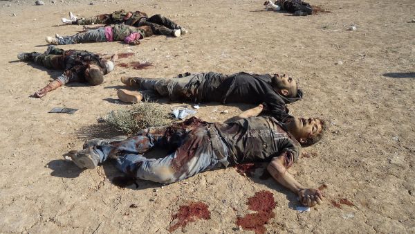A handout picture released by the Syrian Arab News Agency (SANA) allegedly shows bodies of rebel fighters after being ambushed by government forces in the industrial city of Adra outside Damascus (AFP/HO/SANA)