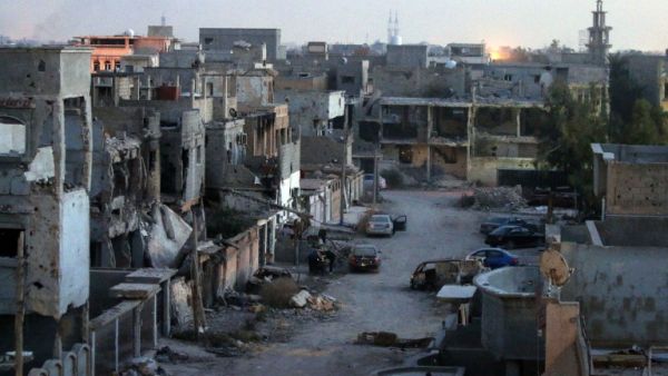 A picture taken on February 27, 2016 shows damaged buildings after forces loyal to Libya's internationally recognized parliament retook the center of Benghazi following fierce fighting with Daesh militants. (AFP/Abdullah Doma)