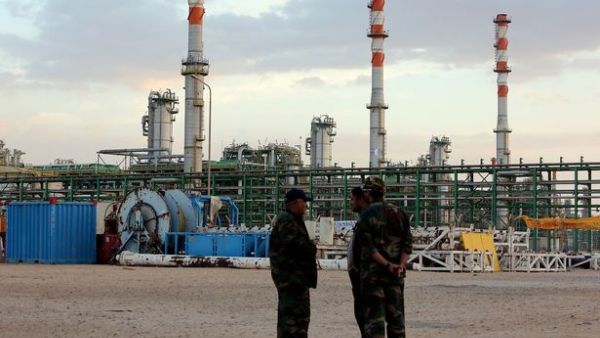 The four men were taken west of Tripoli, the foreign ministry said Monday. (AFP/Mahmud Turkia)