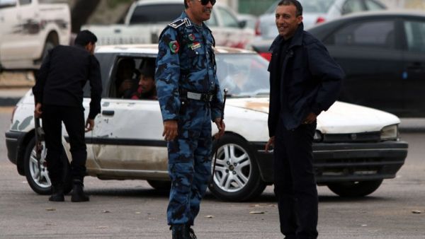 Libyan security forces monitor a protest in Benghazi. (AFP/Abdullah Doma) Libyan security forces monitor a protest in Benghazi. (AFP/Abdullah Doma)