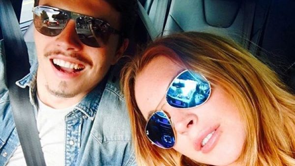 خطيب ليندسي لوهان يهددها بحرق وجهها!