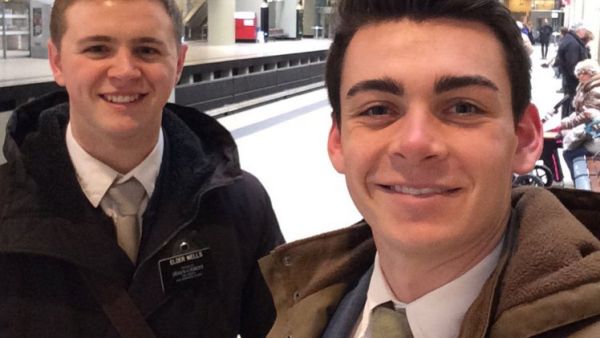 Mason Wells, left, is seen at the Brussels airport shortly before the blast occurred. (Twitter)