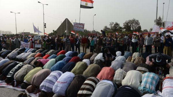 Egyptian protestors pray during a demonstration to show their support for their country's military and against the ruling Muslim Brotherhood, on March 15 in Cairo. (AFP PHOTO / KHALED DESOUKI)