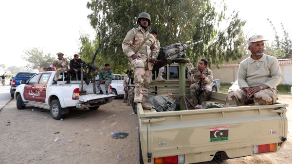 The British defense secretary is in Libya trying to sell arms to the country after its decision to upgrade the military 
