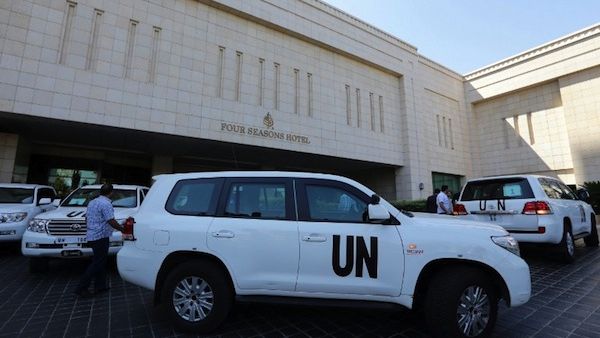 The UN chemical weapons investigation team arrives in Damascus on August 18, 201. (AFP)
