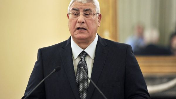 Interim President of Egypt, Adly Mansour, makes statements to the press. [AFP]