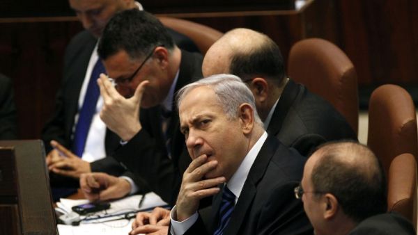 Israeli Prime Minister Benjamin Netanyahu (C) attends a special Knesset (Israeli parliament) session in Jerusalem. (TOPSHOTS/AFP PHOTO/GALI TIBBON)