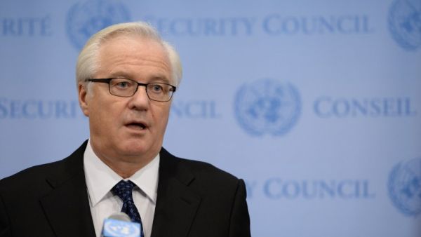 Vitaly Churkin, Russia's Ambassador to the United Nations, speaks to the media after a closed-door meeting of the Security Council on Syria December 16, 2013. [AFP]