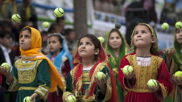 Children work a juggling act