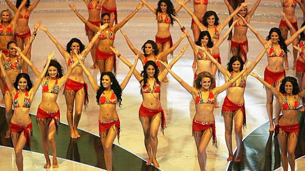 Miss World contestants dance in swimsuits in the Chinese city of Sanya in 2012. [Mark Ralston/AFP/Getty Images]