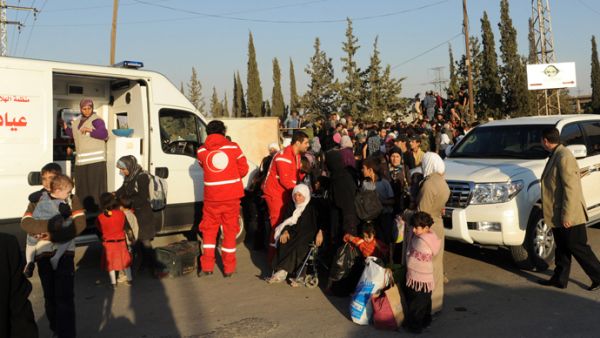 Syrian civilians were evacuated from a besieged town near Damascus earlier this year in a rare truce agreement that suspended rebel-regime fighting to allow Syrians to flee to safety (File Archive/AFP)