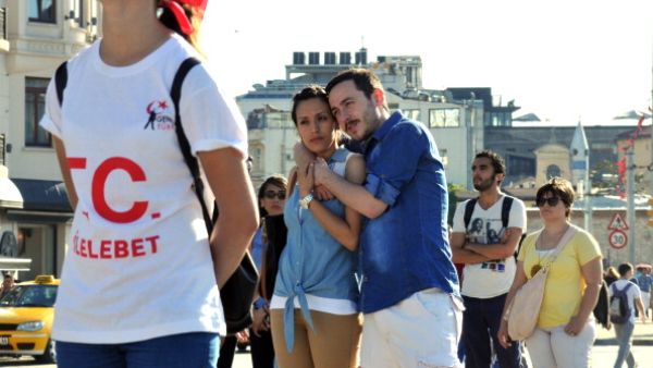  People stand during a silent protest at Taksim Square on June 23 (Getty)