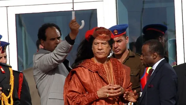 A dry leader keeps 15 second speech short to the point: Rain prevented him speaking further to the Libyan Youth