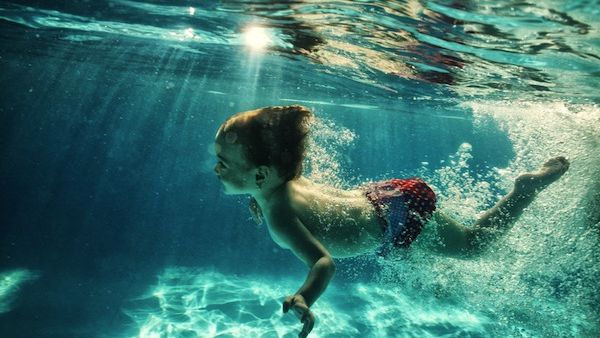 A Dubai court has posthumously blamed a nine-year-old boy for drowning at a pool party. (Shutterstock)