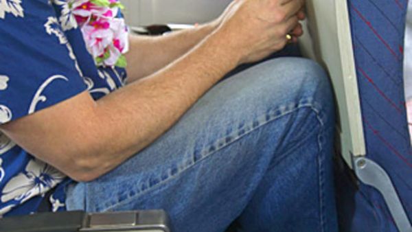 Riding like this in an airplane can do more than make you grumpy--it could kill you!