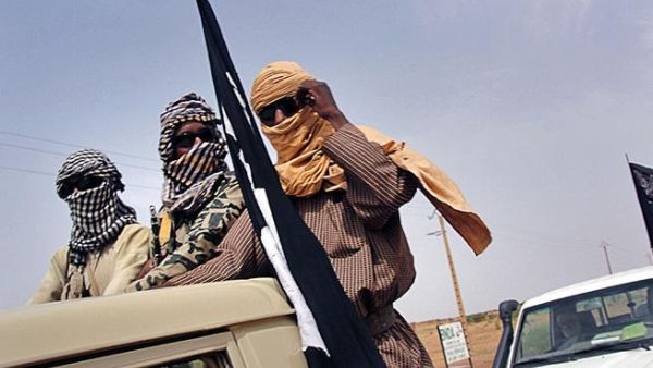 Fighters from al-Qaeda splinter group MUJAO watch Gao airport on August 7th. Al-Qaeda central is reportedly shifting operations from Afghanistan to North Africa. (AFP/Romaric Ollo Hien)