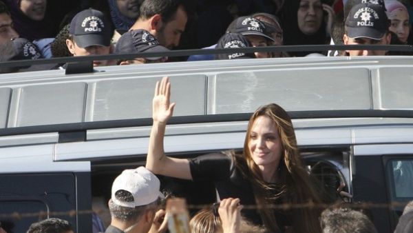 Angelina Jolie does her bit on her Mid-East tour of refugee visits, for stranded Syrians in Turkey, having checked off Libyans in Tunisia recently.
