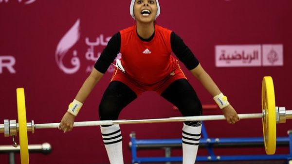 Noof Omar of Yemen attempts the women's 53 kg! (Image courtesy of "newsobserver.com")