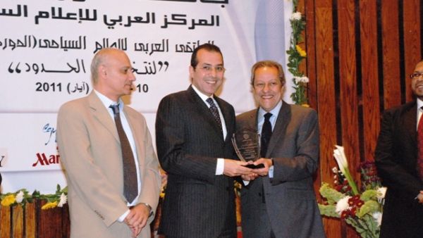 Haitham Nassar, Ramses Hilton General Manager, receiving the Award