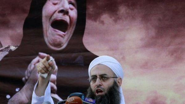 Radical Lebanese sheikh Ahmad al-Assir addresses supporters during a protest against the Syrian regime, in Beirut on October 14, 2012. (AFP/Anwar Amro)