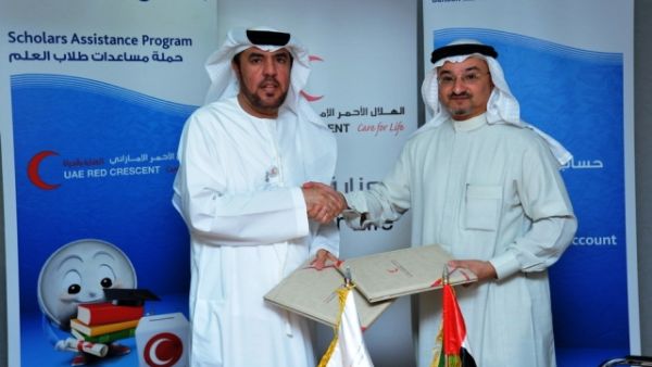 Dhafer Luqman, EVP at ADIB and Mohammed Al Hammadi, Deputy Secretary General for Local Affairs at UAE Red Crescent Authority
