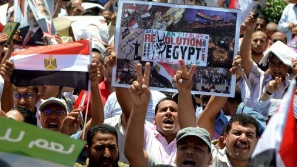 Egypt's main cities have frequently erupted in protest since Mohmmad Morsi's overthrow. (AFP/File)