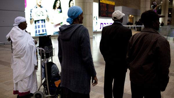 Ethiopian immigrants arrive at Israel's Tel Aviv airport.