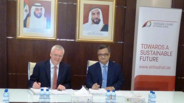 CEO of Etihad Rail signing the agreement with PCM Strescon CEO