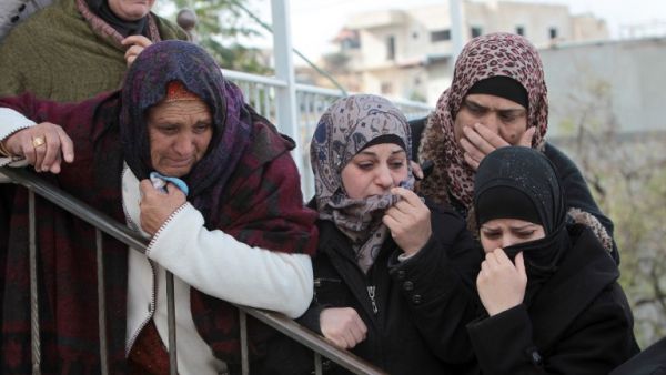 Women mourn the death of 16-year-old Mohammed Abu Khdeir who was kidnapped and burned to death on July 2 (File Archive/AFP)