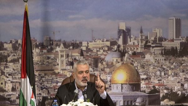 Hamas Prime Minister in the Gaza Strip Ismail Haniya gives a policy statement in a televised address in Gaza City on October 19, 2013. (AFP)