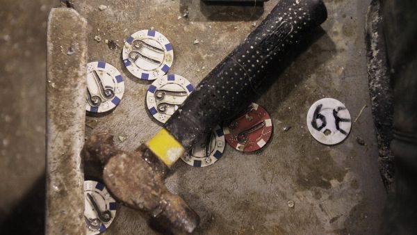 Smashed over the head with a hammer and then stabbed 30 times in a frenzied, this co-worker met his end.