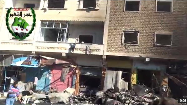 A shot of the damage in the popular Darkoush market shortly after the car bomb exploded. (YouTube/MiddleEastBrk)
