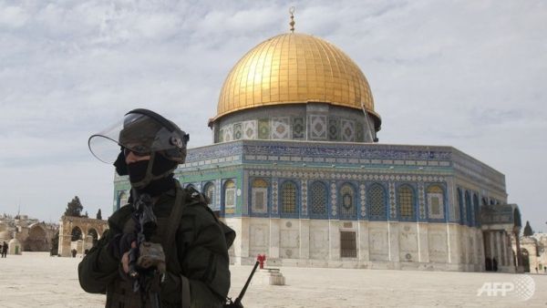 14 right wing Israelis were arrested on Monday after raising an Israeli flag and singing and dancing in the holy Al Aqsa mosque compound in Jerusalem. (AFP/File)