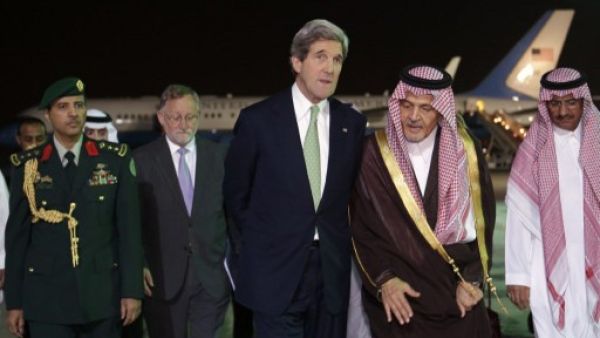 John Kerry is greeted by Saudi counterpart Prince Saud Al Faisal. John Kerry is greeted by Saudi counterpart Prince Saud Al Faisal.