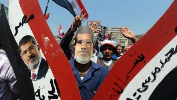 Supporters of ousted Egyptian president Mohamed Morsi  at a demonstration in Cairo on July 26, 2013 (AFP)