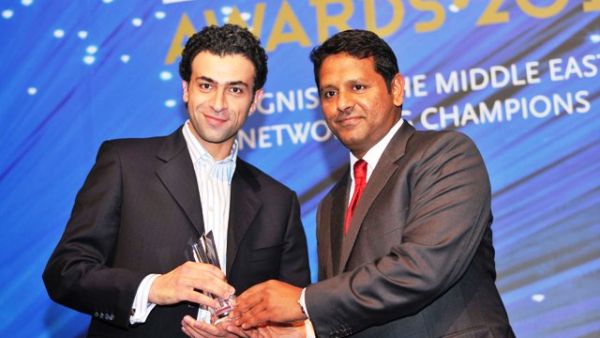 Nader Baghdadi, Regional Sales Manager of Motorola, receiving the award
