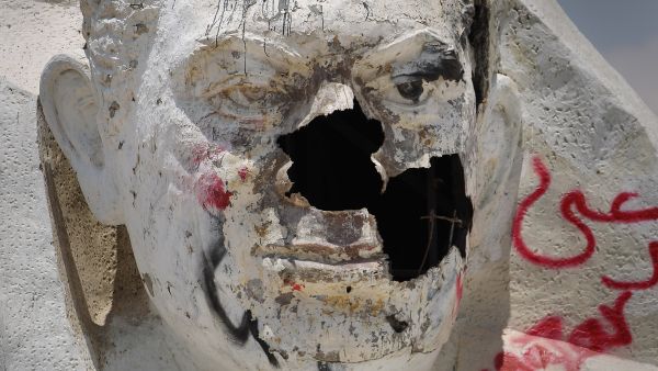 Destroyed statue of Mubarak.