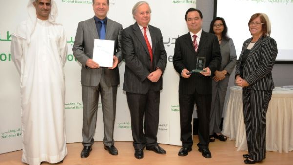 Adrian Goh and NBAD executives during the award ceremony