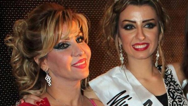 Nadine Fahad (R) is crowned queen. Nadine Fahad (R) is crowned queen.