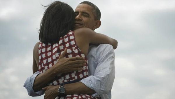 President Obama hugs his wife Michelle  President Obama hugs his wife Michelle